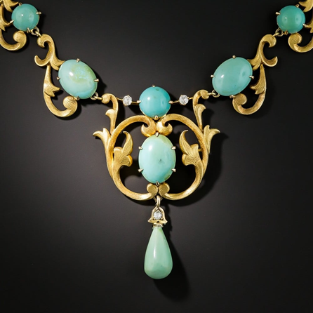 An necklace from the Art Nouveau period featuring gold scrolling motifs and turquoise gemstones; Image: Lang Antiques 