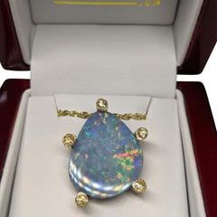 9.90ct Opal Pendant set with Rose Cut Diamonds in 14kt Yellow Gold
