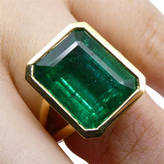 Emerald Cut Emerald Ring set in 14kt Yellow Gold