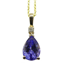 2.7ct Tanzanite pendant set with 0.05ct Diamonds set in 14kt Yellow Gold custom designed and manufactured by David Saad of Skyjems.ca