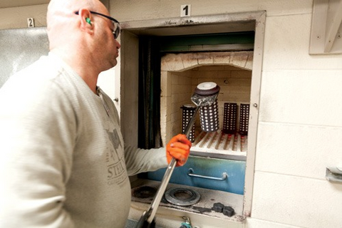 Multiple finished casting shells are placed into a kiln to facilitate the “burnout” of wax models contained within them; Image: Stuller Blog 