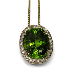 GIA Certified Peridot Pendant set with Diamonds in 14kt Yellow Gold