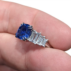 Blue Sapphire Ring with Diamond Baguettes set in 18k White Gold