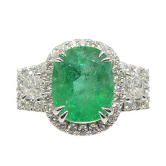 4.59ct Cushion Emerald, Diamond Halo Engagement Ring set in 18k White Gold, custom designed and manufactured by David Saad/Skyjems.ca