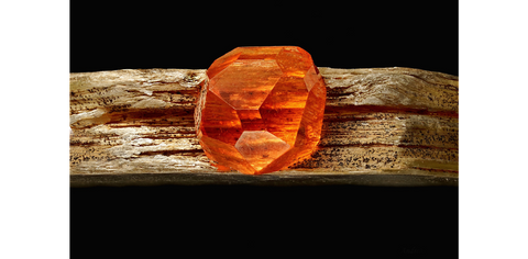 A “mandarin orange” spessartine garnet crystal on muscovite mica matrix from Gilgit-Baltistan, Pakistan