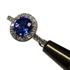 Vivid Unheated Sri Lankan Sapphire Ring in 18k with Diamond Halo