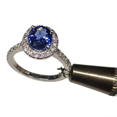 Vivid Unheated Sri Lankan Sapphire Ring in 18k with Diamond Halo