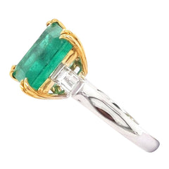 6.16ct GIA Certified Colombian Emerald Three Stone Ring with Diamond Baguettes, set in 18kt White and Yellow Gold