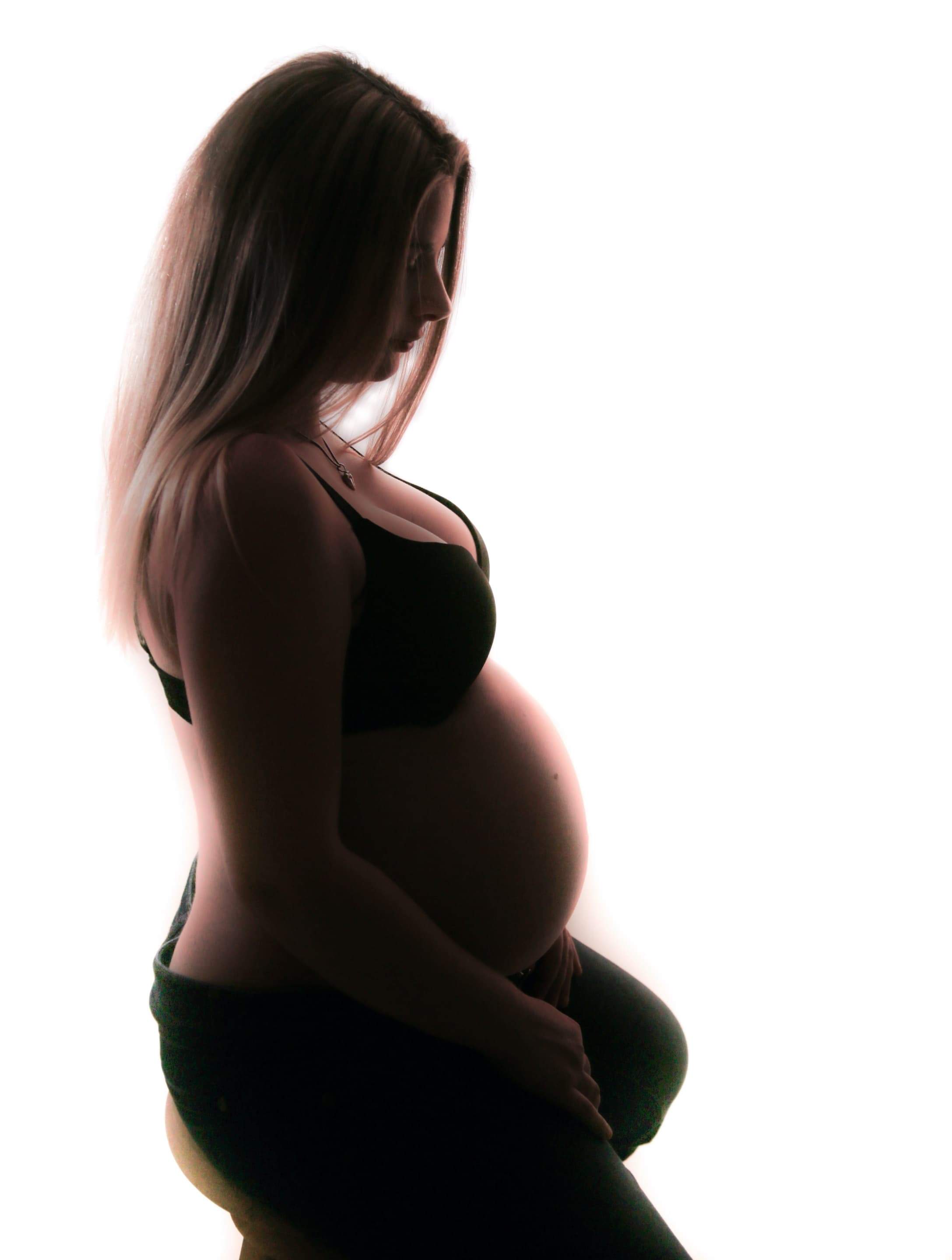 Silhouette photograph of a pregnant woman