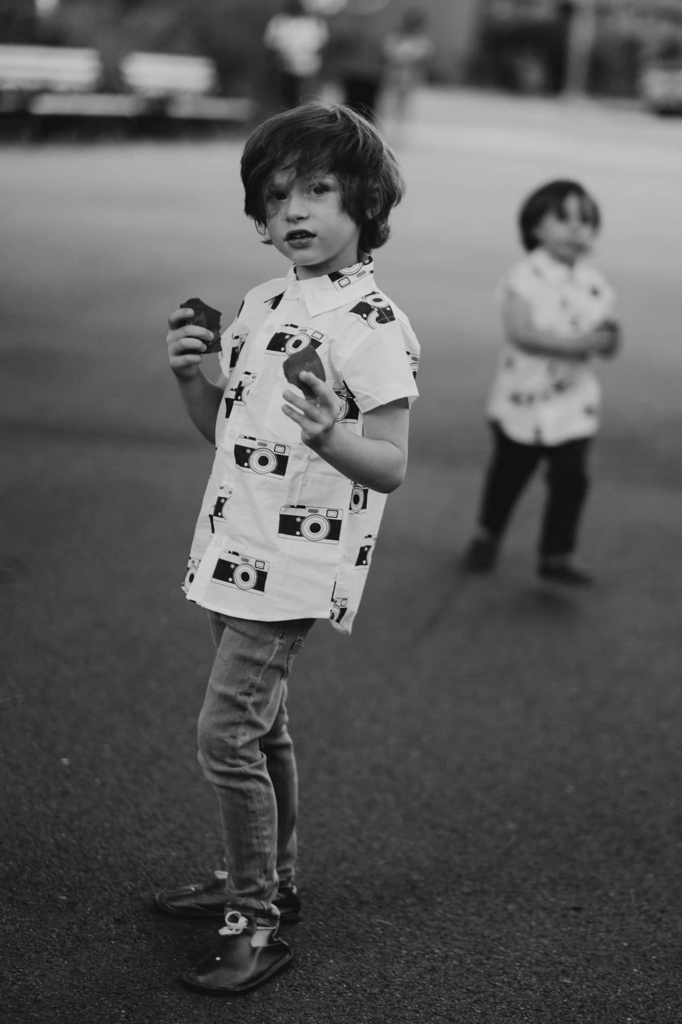 Two boys happy and playing outside