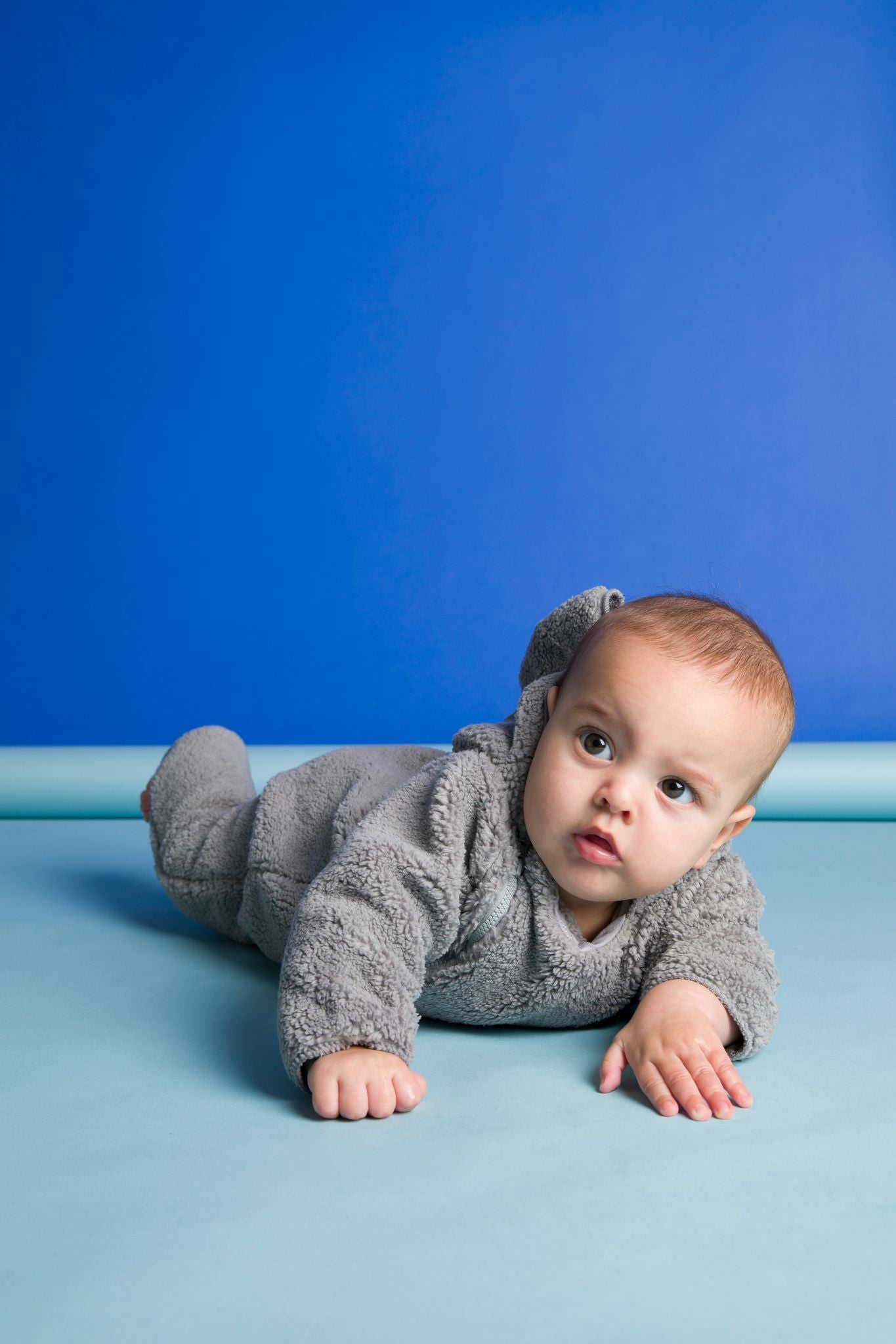 Picture of two babies not crawling. Is your baby not crawling? Here are some tips to help.