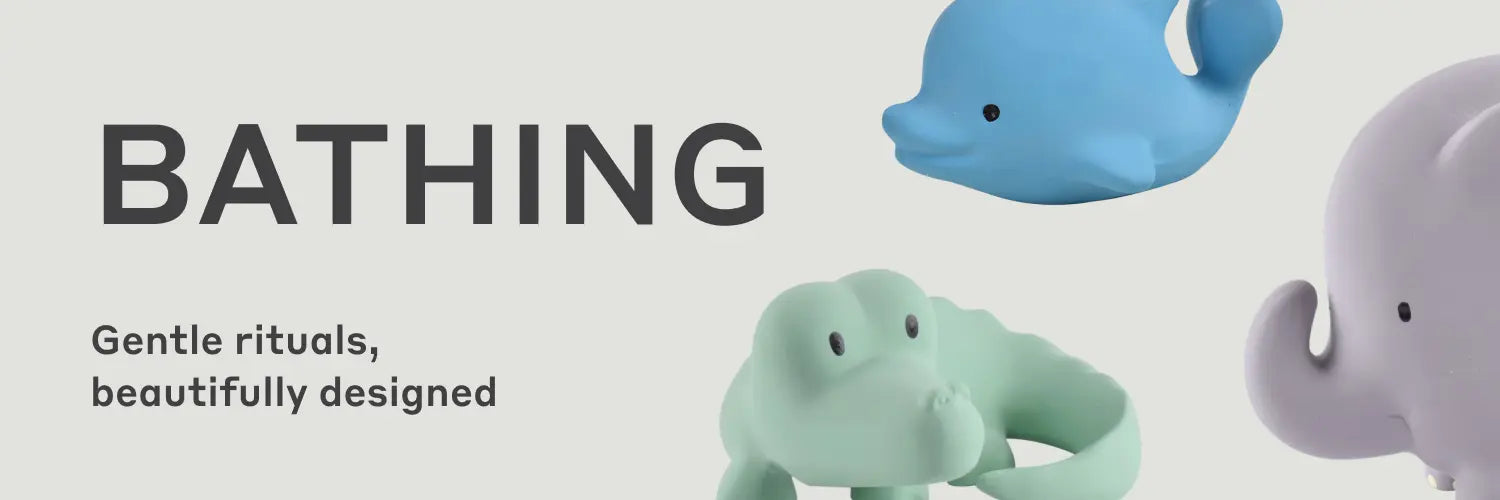 Banner with text 'BATHING' and subtext 'Gentle rituals, beautifully designed', featuring pastel animal bath toys including an elephant, whale, and hippo.