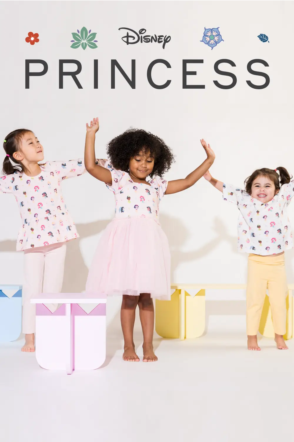Toddler girls in Disney Princess print clothing