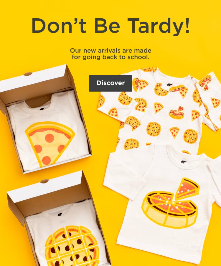 Flatlay of Pizza Lovers print clothing with text: 'Don't Be Tardy: Our new arrivals are made for going back to school' - Shop Now