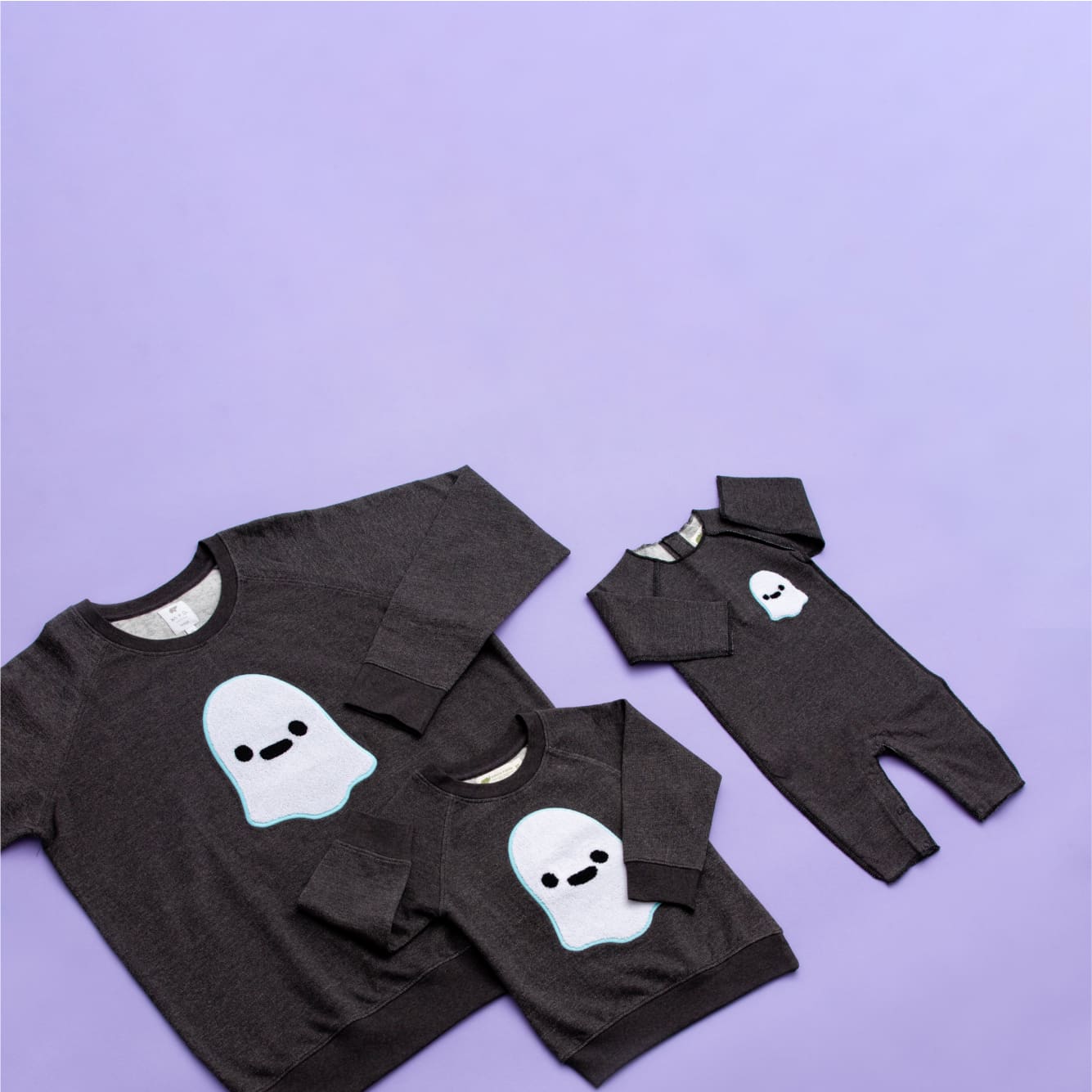 Flatlay of Friendly Ghosts print clothing on purple background