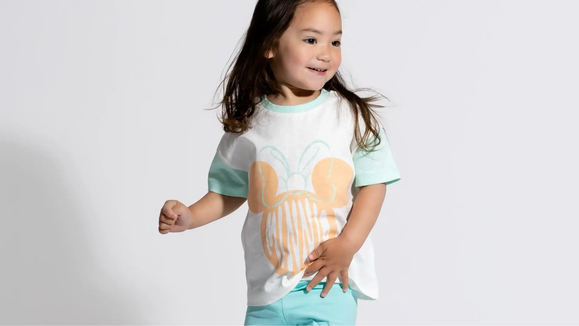 Girl in matching Sunshine Minnie print