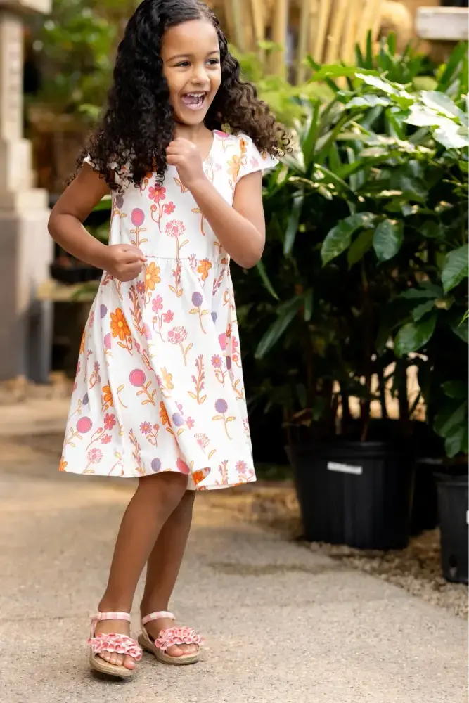 Girl in spring print floral dress