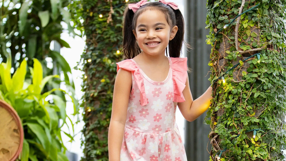 Girl outside wearing Pink Flowers print dress