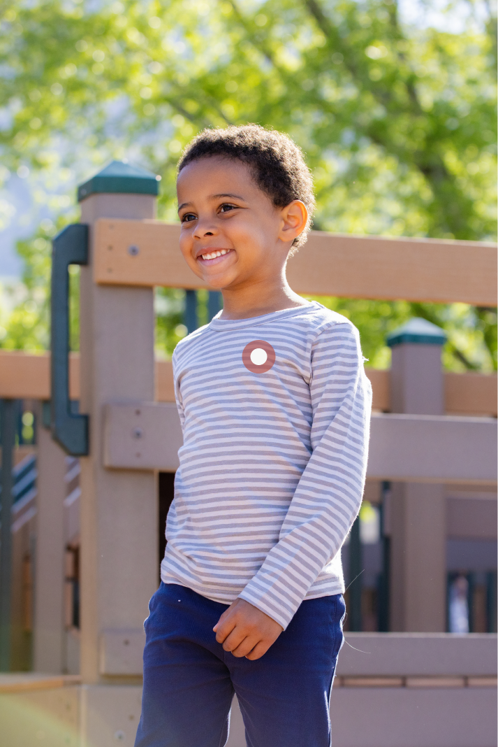 Baby essentials collection including onesies, bibs, and daily care items