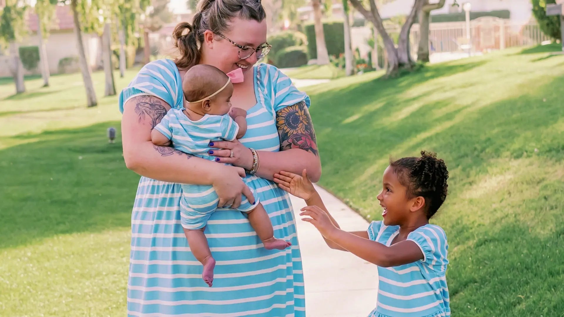 Two babies in matching easter rompers