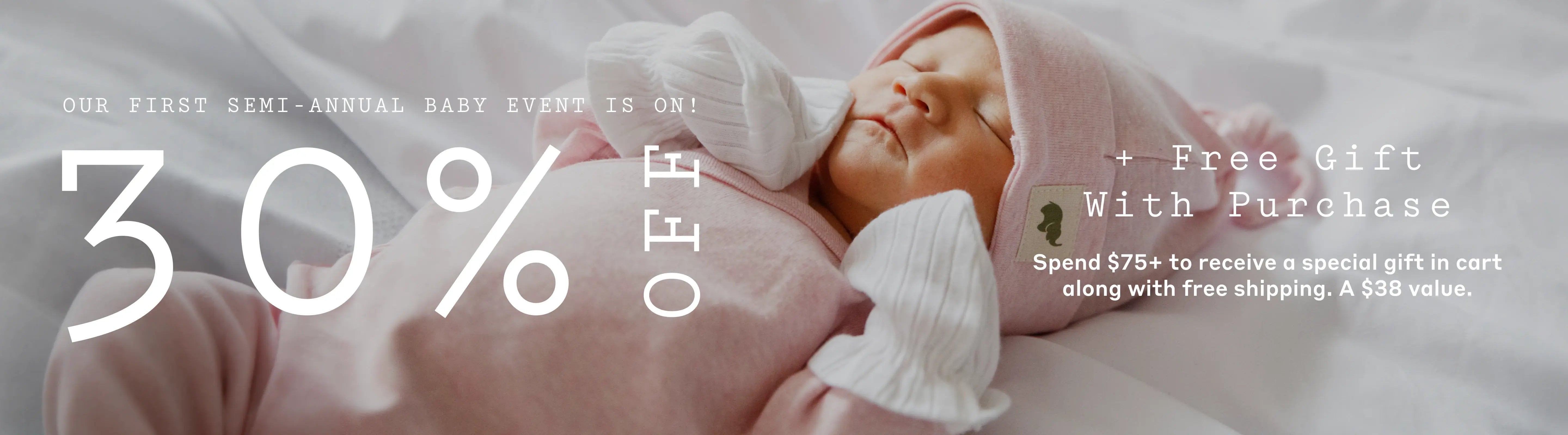 Slim banner with text: 30% Off + Free Gift w/ $75+ Purchase. Our First Ever Semi-Annual Baby Event Is On. Spen $75+ to receive a special gift along with free shipping. A $38 Value.