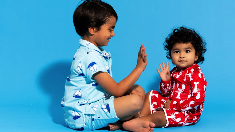 Toddlers in multicolor swimwear