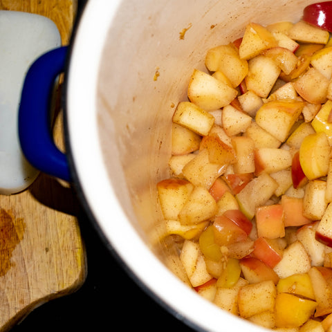 Apple compote in pot on stove