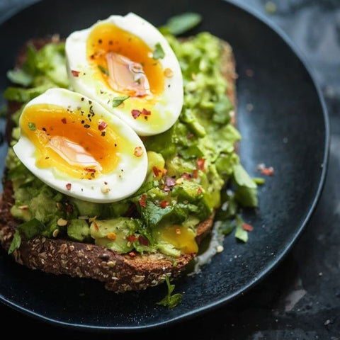 smashed avo and runny eggs on toast