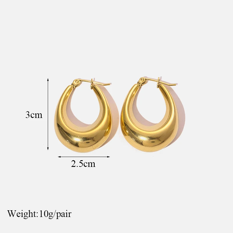 Gold hoop earrings with measurements and weight information on a white background