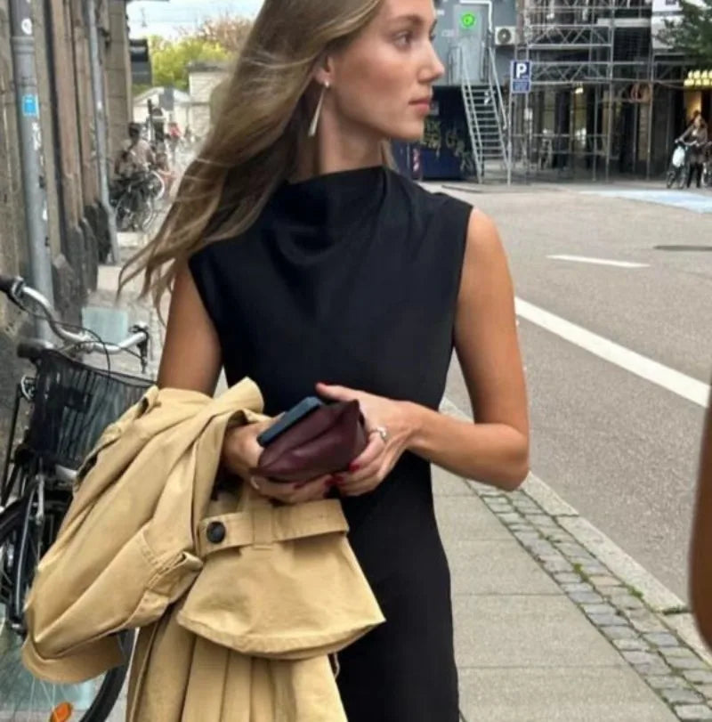 Drop earrings styled with trench coat