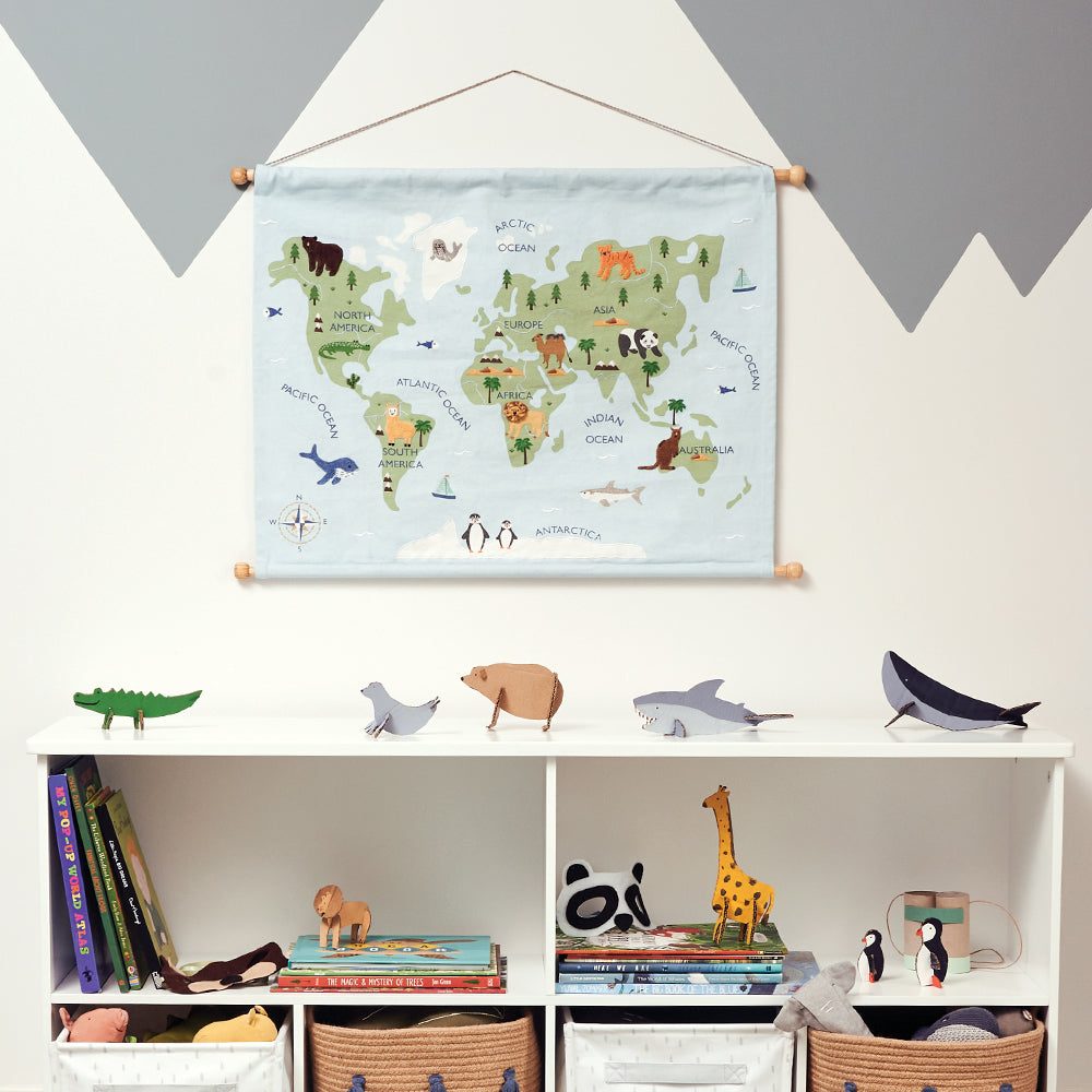 Cardboard animals Earth day crafts below around the world wall hanging