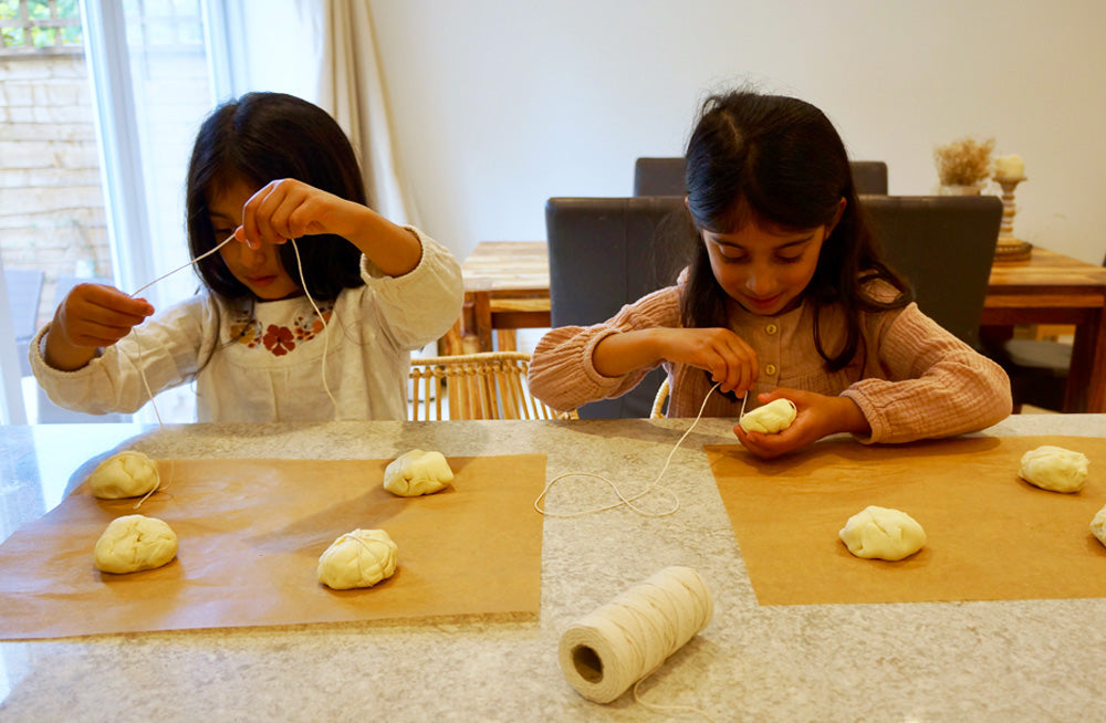 Final stages of making puff pastry pumpkins