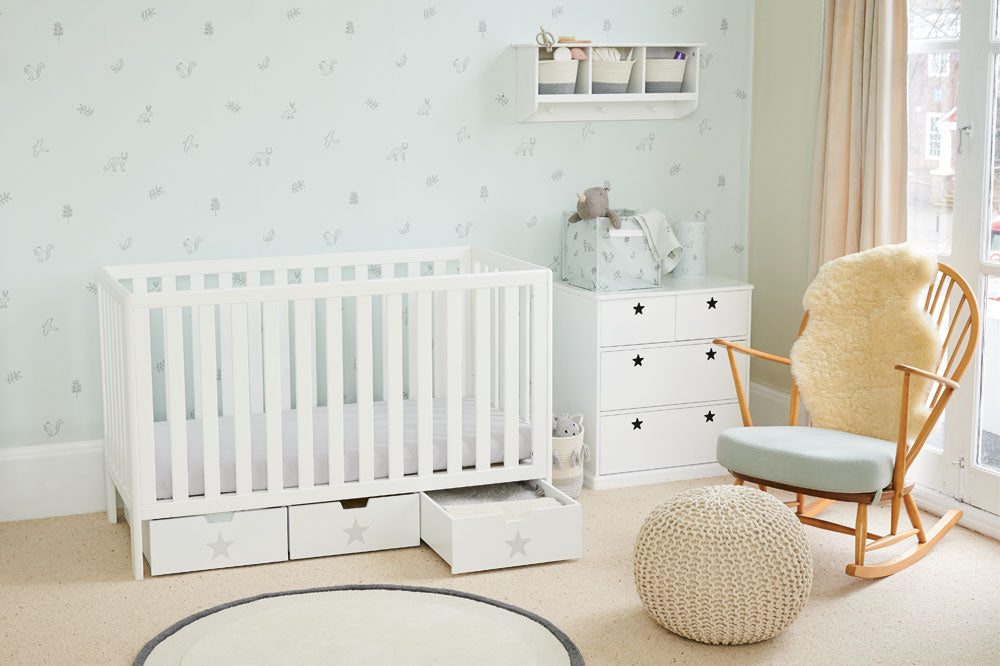 Neutral nursery with white cot bed