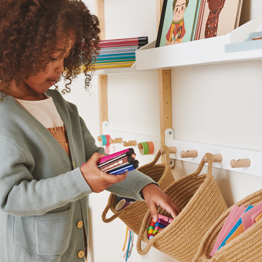 This clever IKEA hack combines a toddler bookshelf and craft storage box