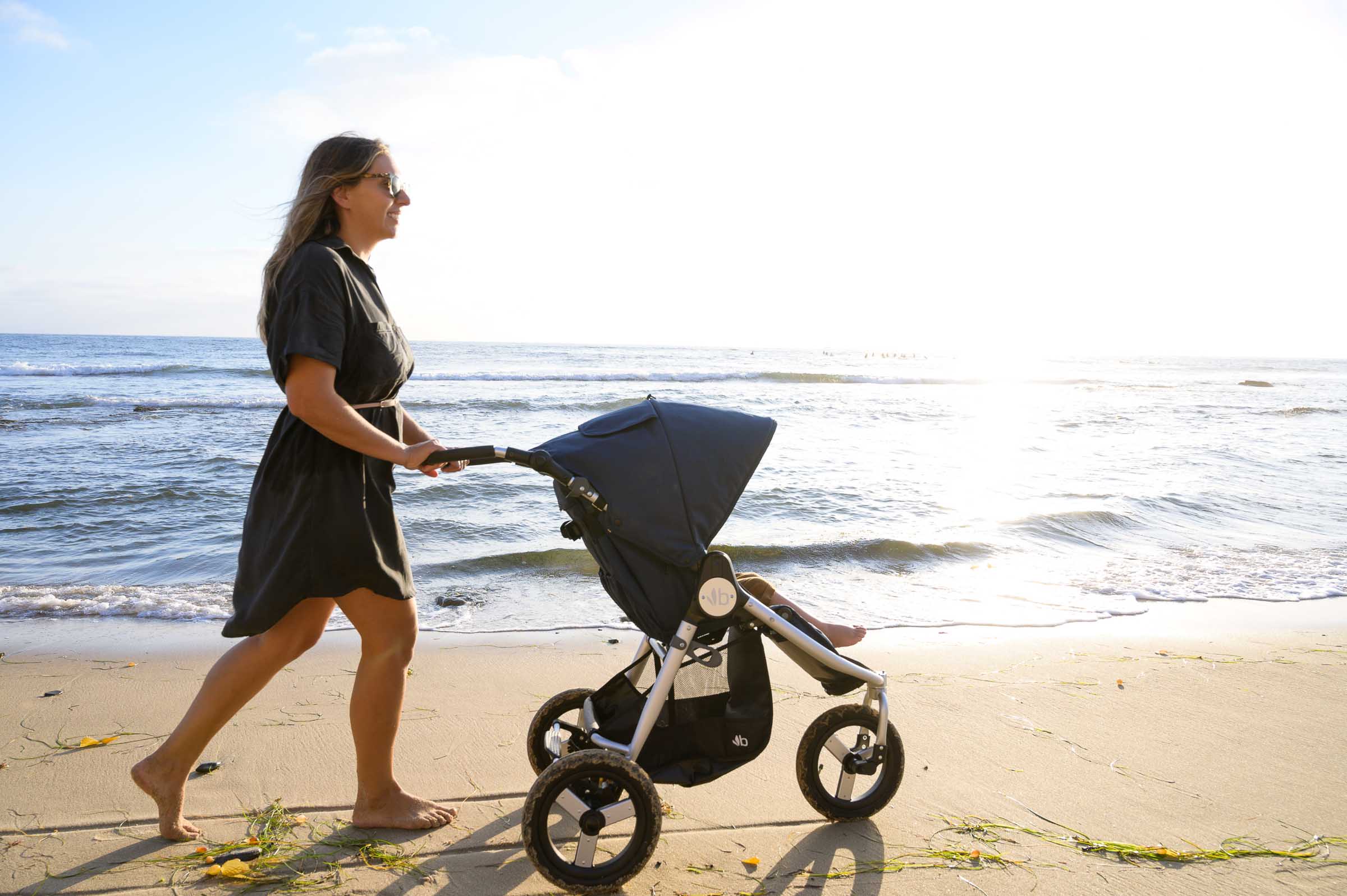 2021 Bumbleride Indie walking on beach sand