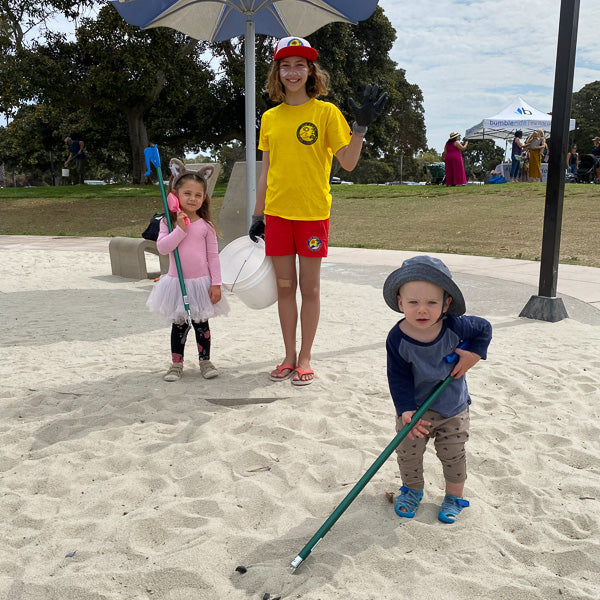 Family Cleaning Up Park - Bumbleride Cleanup