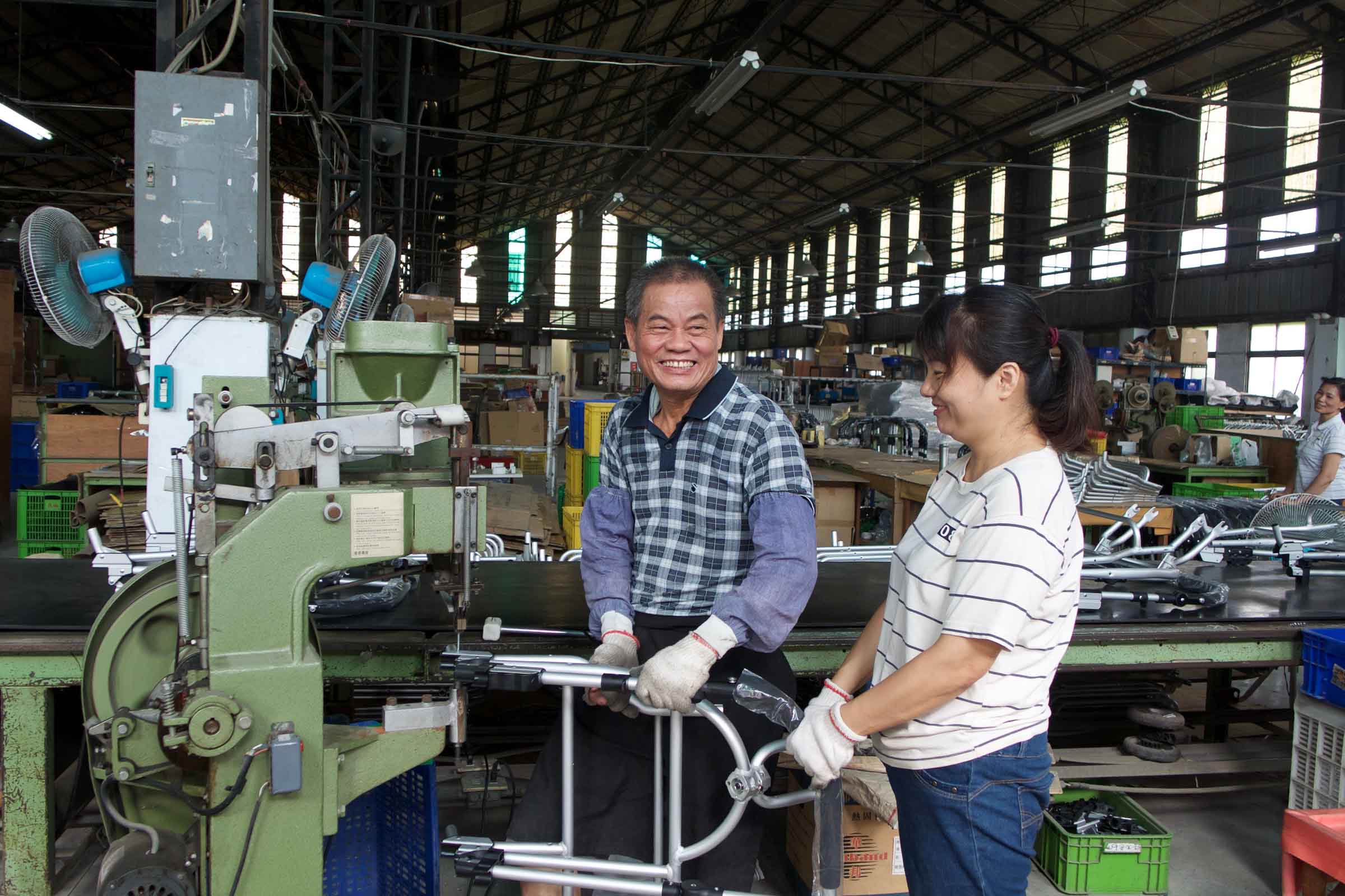 Bumbleride Factory Workers Smiling