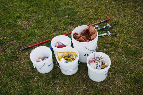 Picture of bumbleride park cleanup buckets of trash