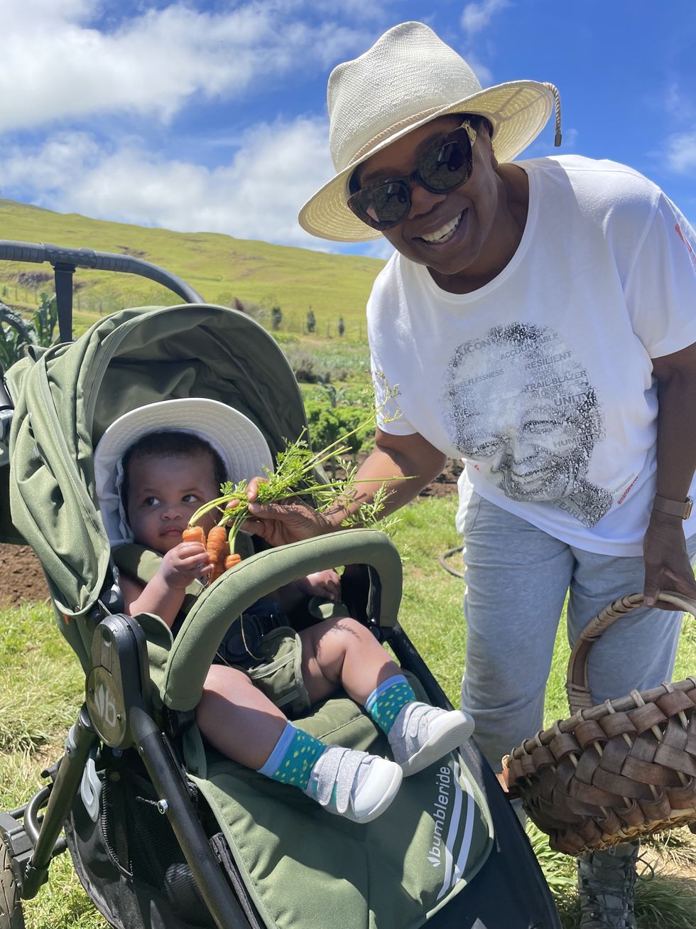 Oprah with Kirby Bumpus's son Luca in Olive Speed