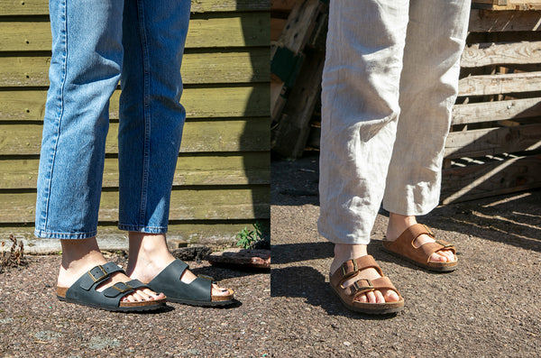 soft step cork slide sandals with buckles, one pair is black and other pair is brown