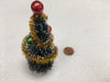 Tiny tinselled christmas tree