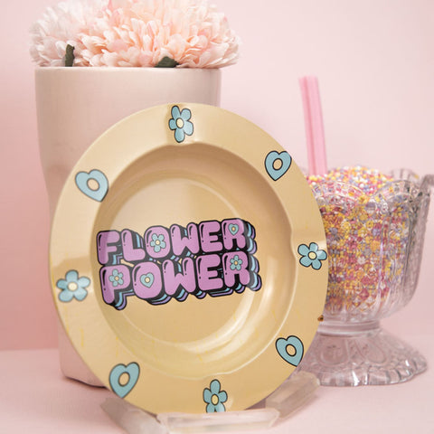 Planet X | Flower Power Metal Ashtray with sprinkles in a cup with a straw and a flower pot