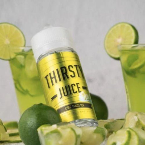 Thirsty Juice Co | Lime Tahiti Ice 100ml bottle with 2 glasses of lime juice and sliced limes everywhere