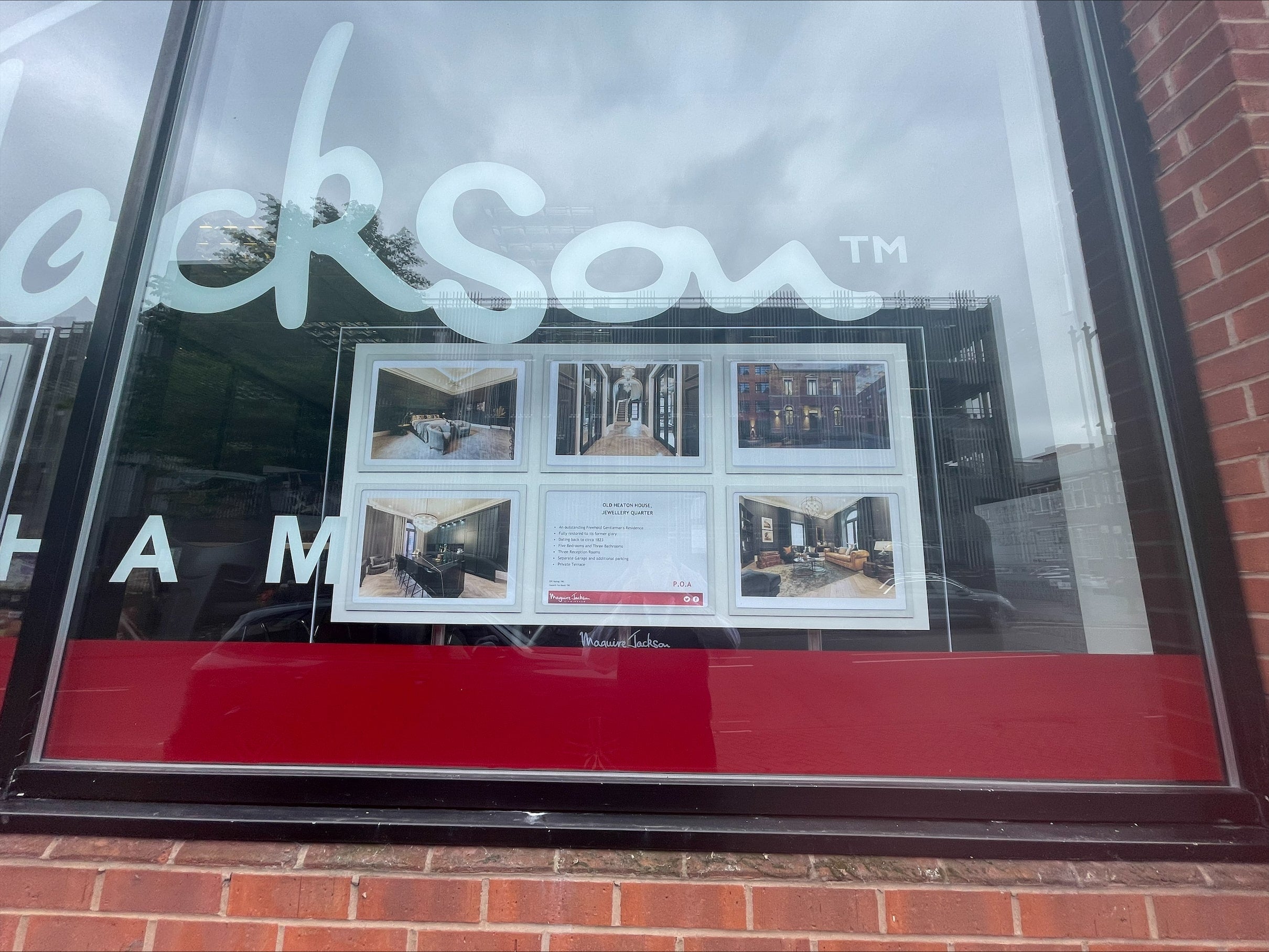 maguire jackson property window display