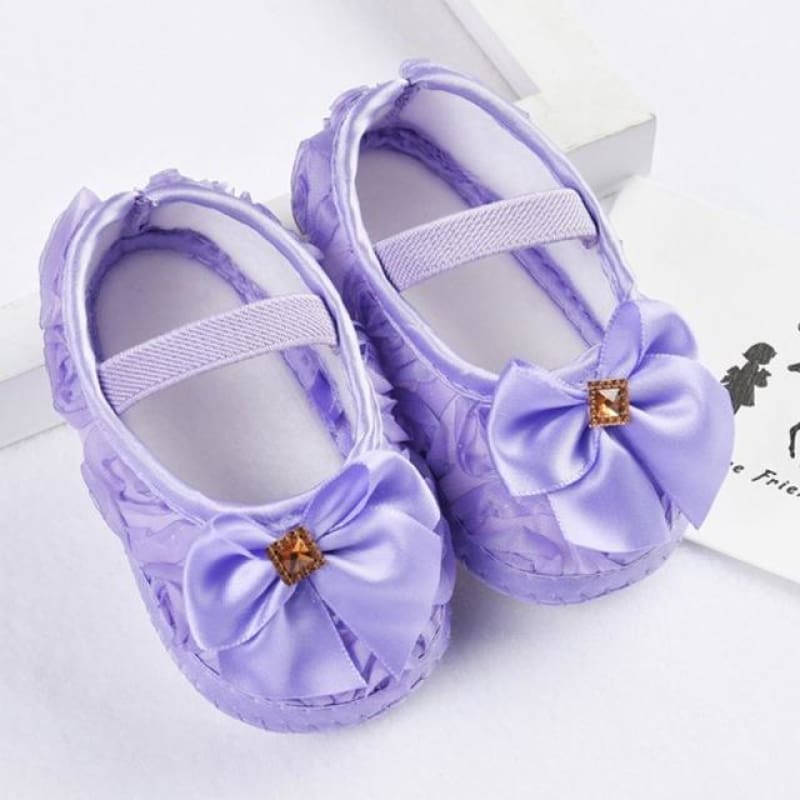 purple baby shoes