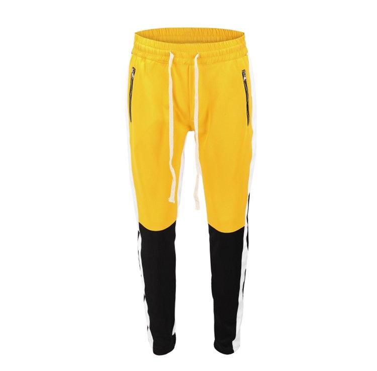 track pants black and yellow