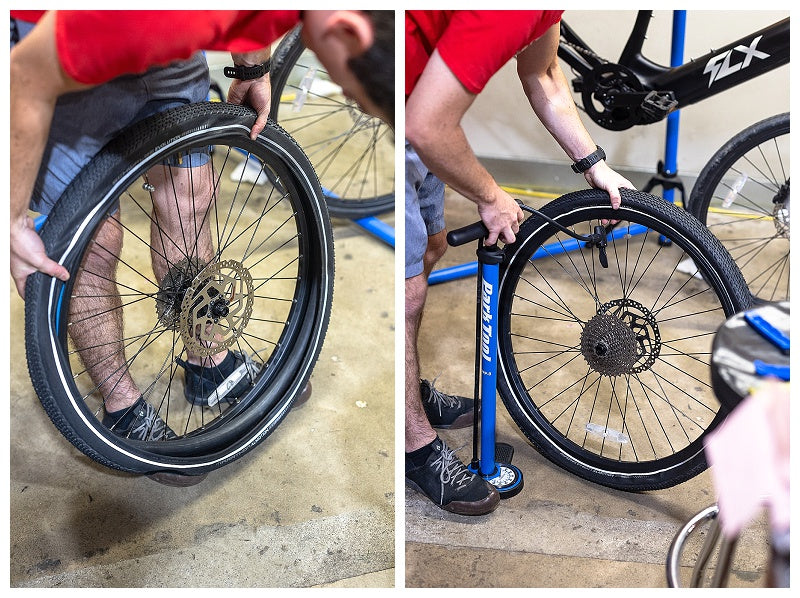 A man in a bike shop installing and inflating new tires on an FLX Step Through comfort ebike