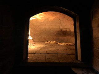 Fire-burning pizza oven at Filaga da Giacomino