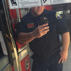 California Fire Fighter Wearing skin guards sleeves