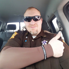 Law Enforcement Officer Covers Up Tattoos on Duty